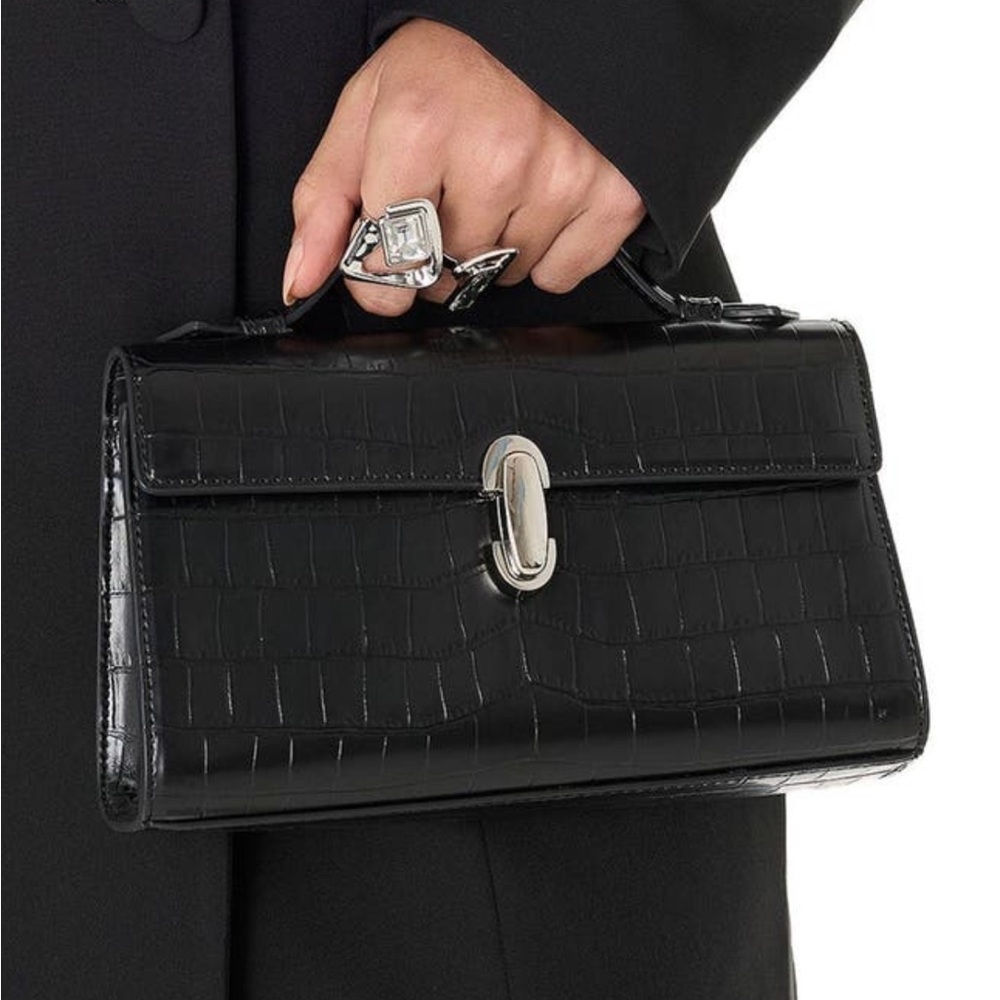 The noli shop Danica croco symmetry clutch
